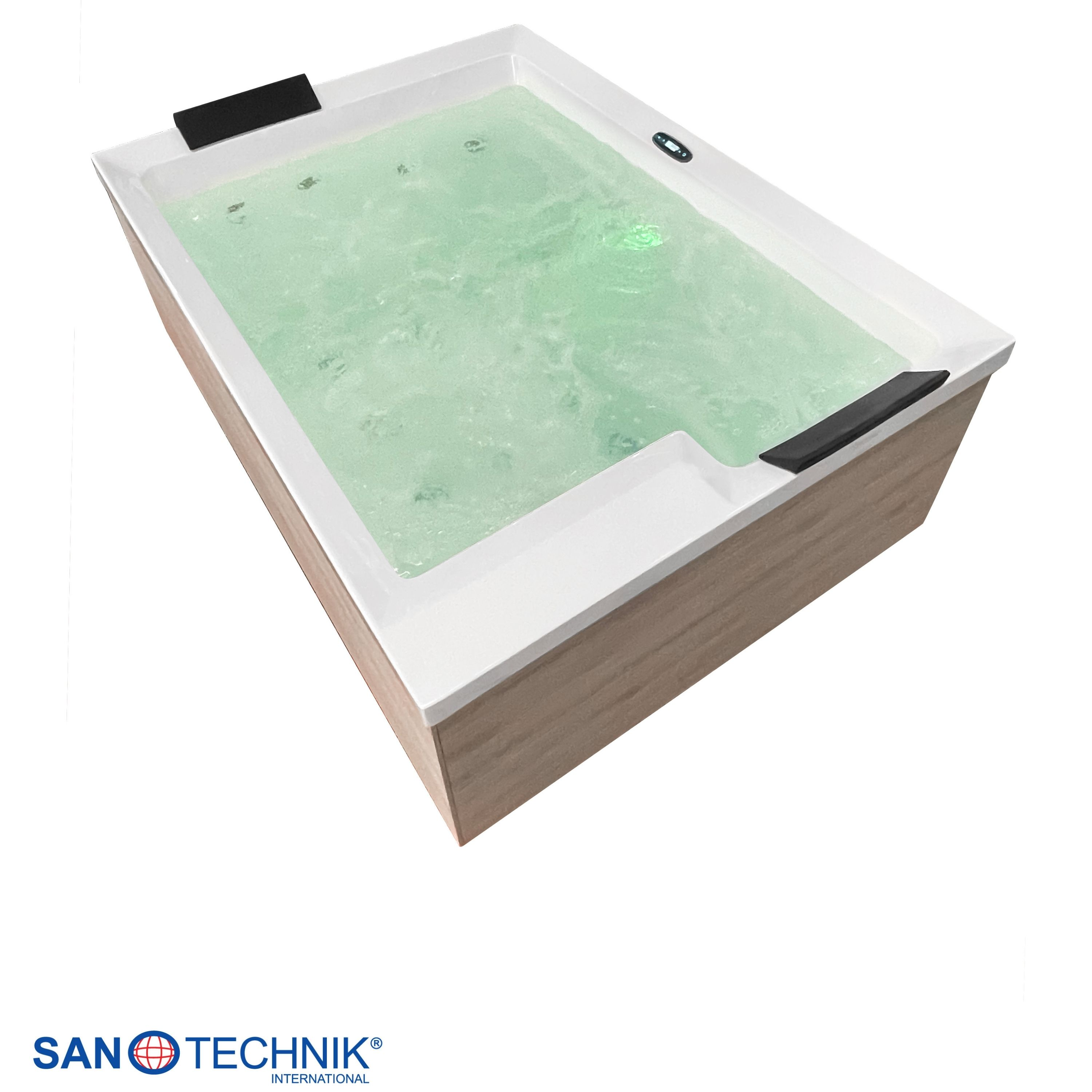 Ein moderner weißer Whirlpool mit holzfarbenem Rand, gefüllt mit sprudelndem grünem Wasser.