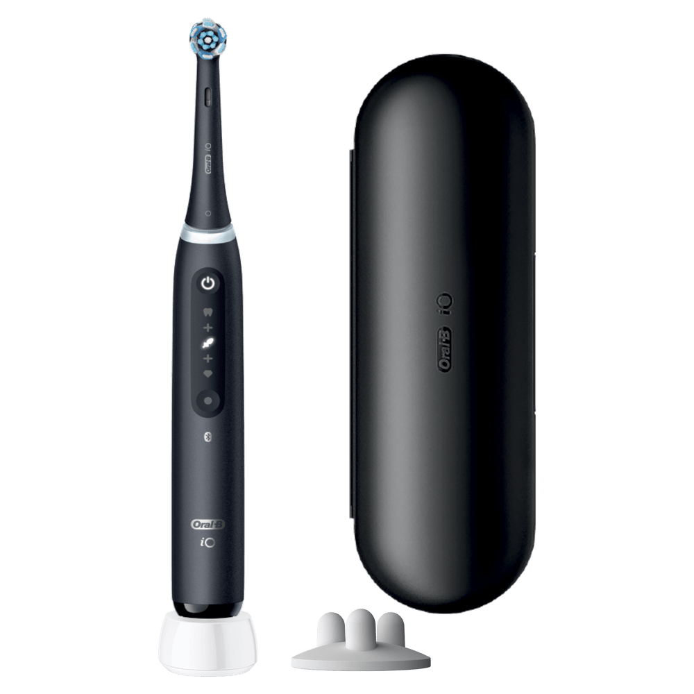 Cepillo de dientes eléctrico negro con base de carga, estuche de viaje y soporte.