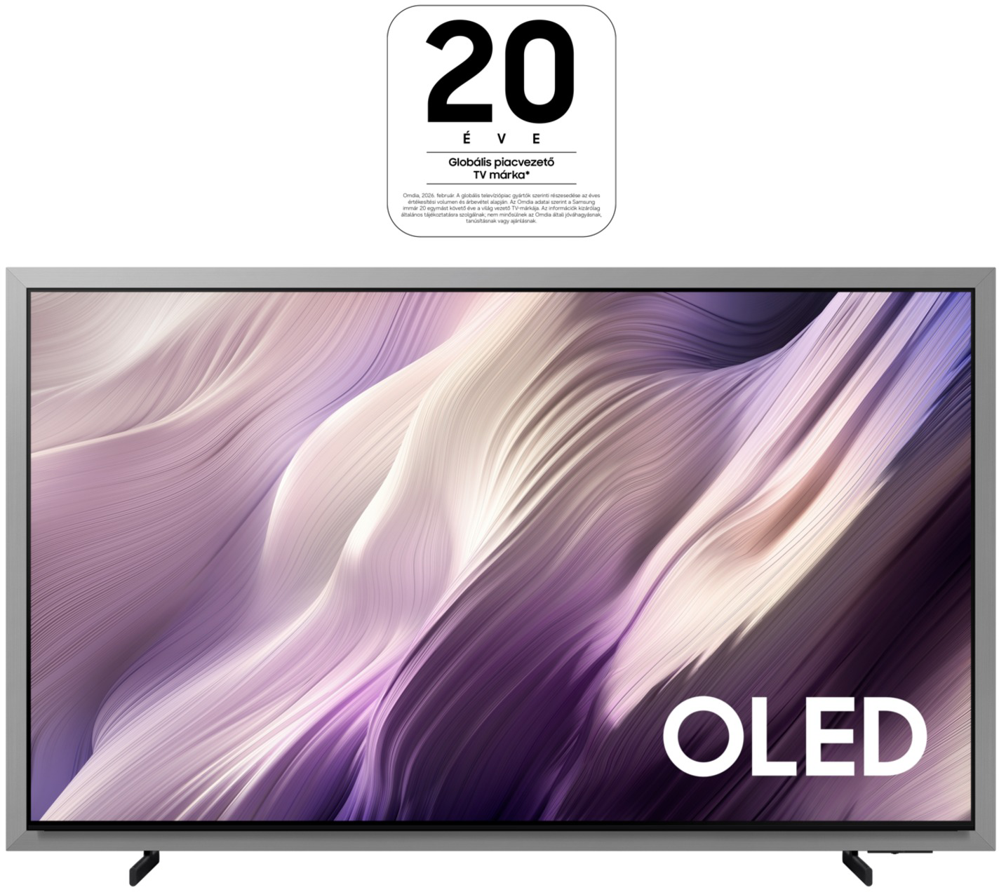 Ezüst OLED TV lila-fehér mintás háttér előtt. Bal felső sarokban 20-as szám.
