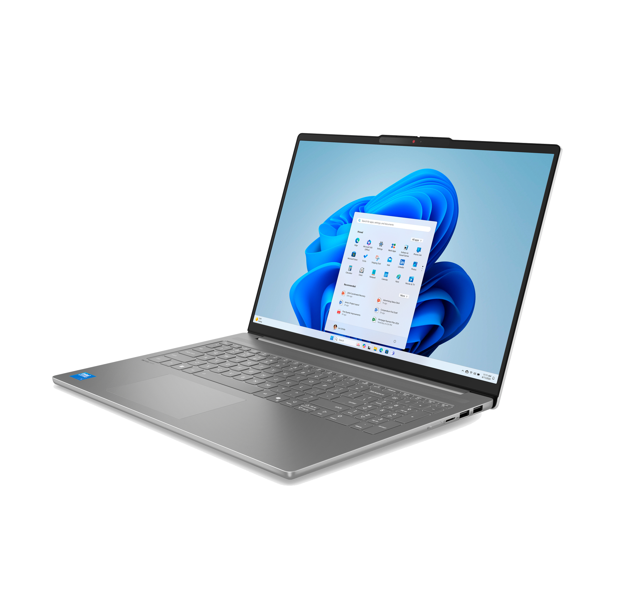 Un portátil plateado con la pantalla abierta, mostrando Windows 11.
