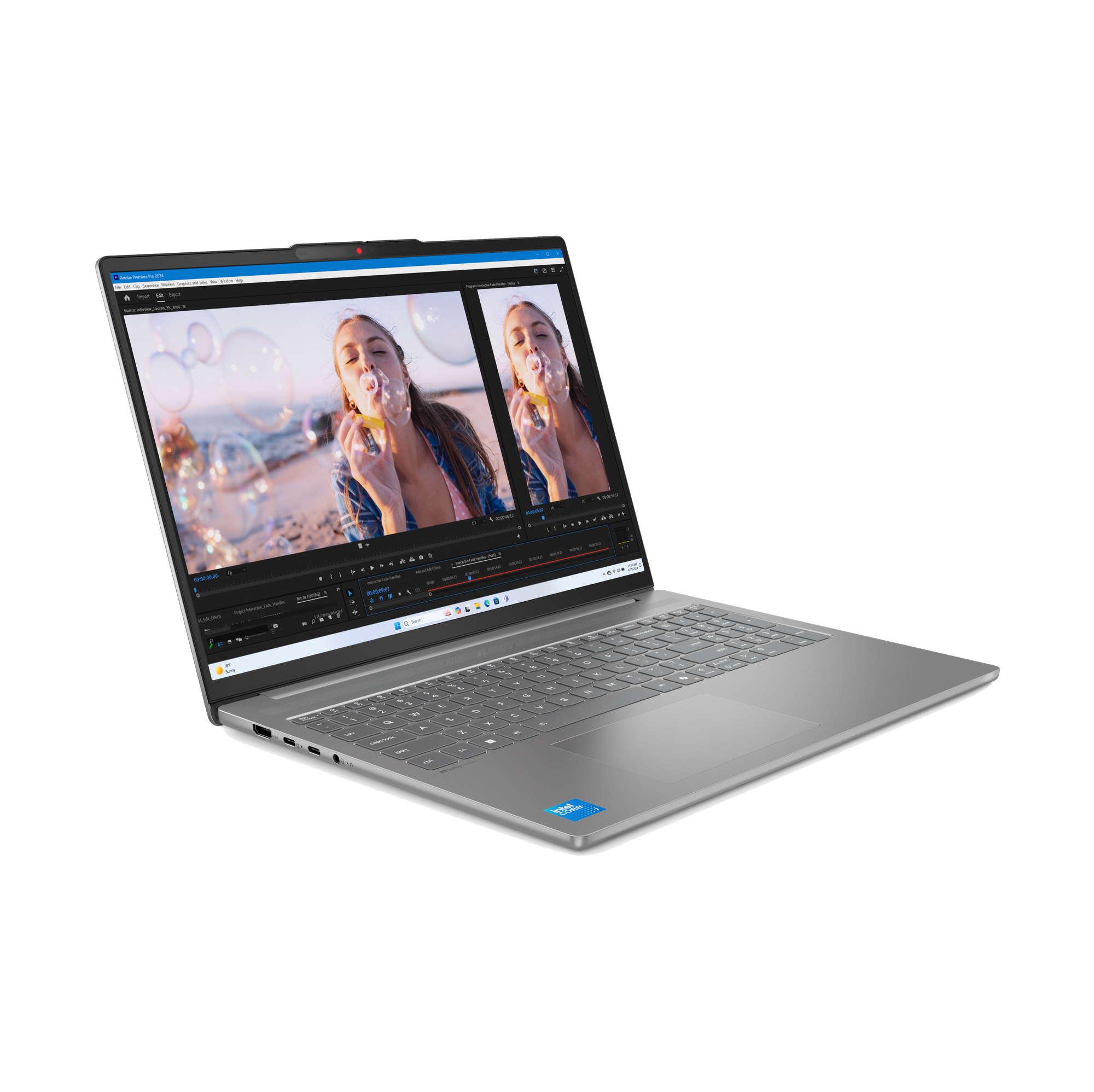 Un portátil plateado muestra software de edición de vídeo con burbujas y una mujer.