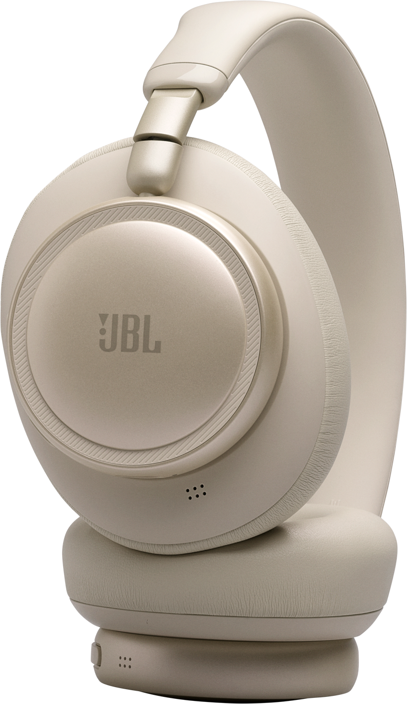 Cuffie JBL beige con padiglioni e archetto regolabile su sfondo nero.