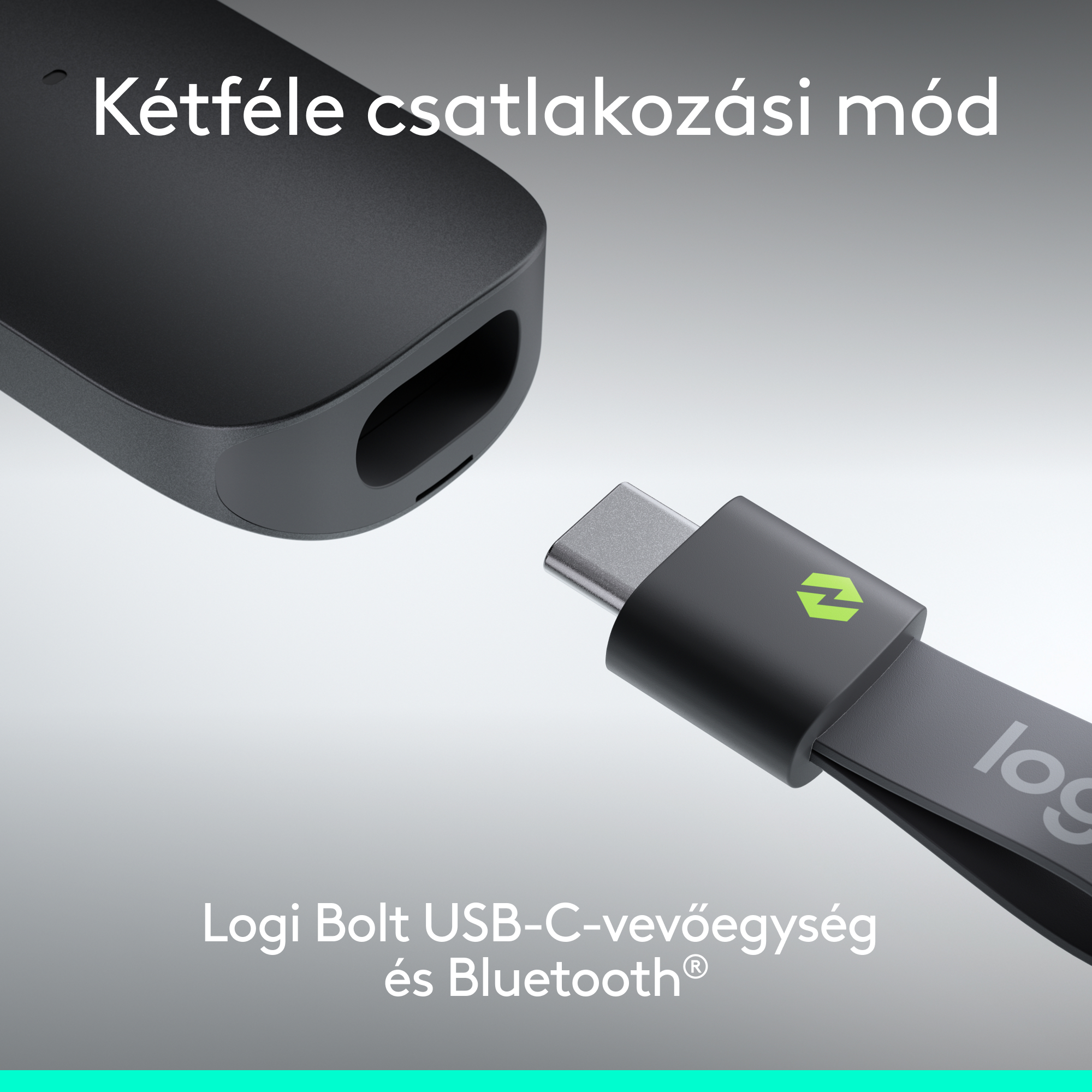 Egy fekete USB-C hardverkulcs egy nagyobb fekete eszközbe helyezve.
