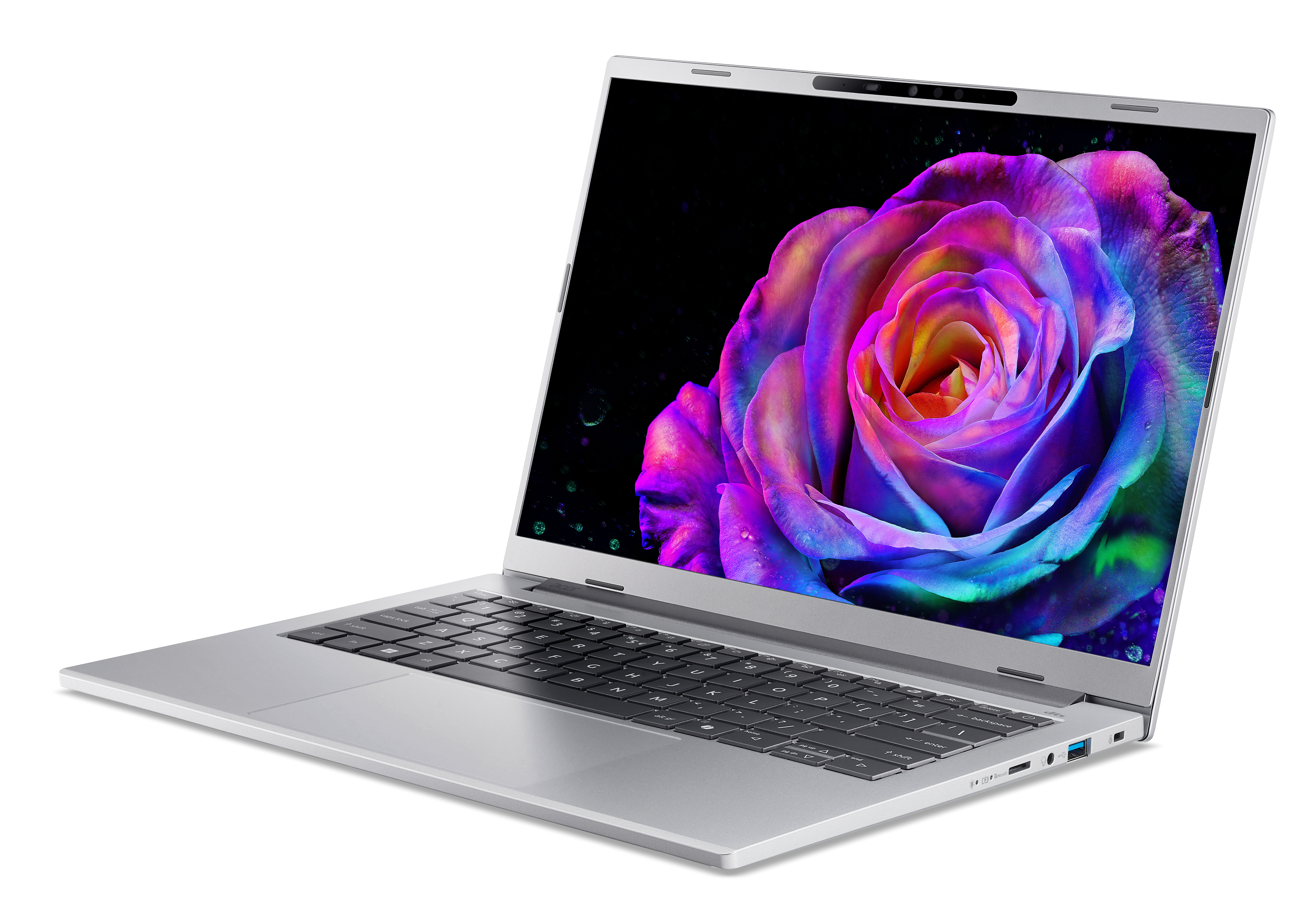 Otwarty srebrny laptop wyświetla wielokolorową różę na ekranie.