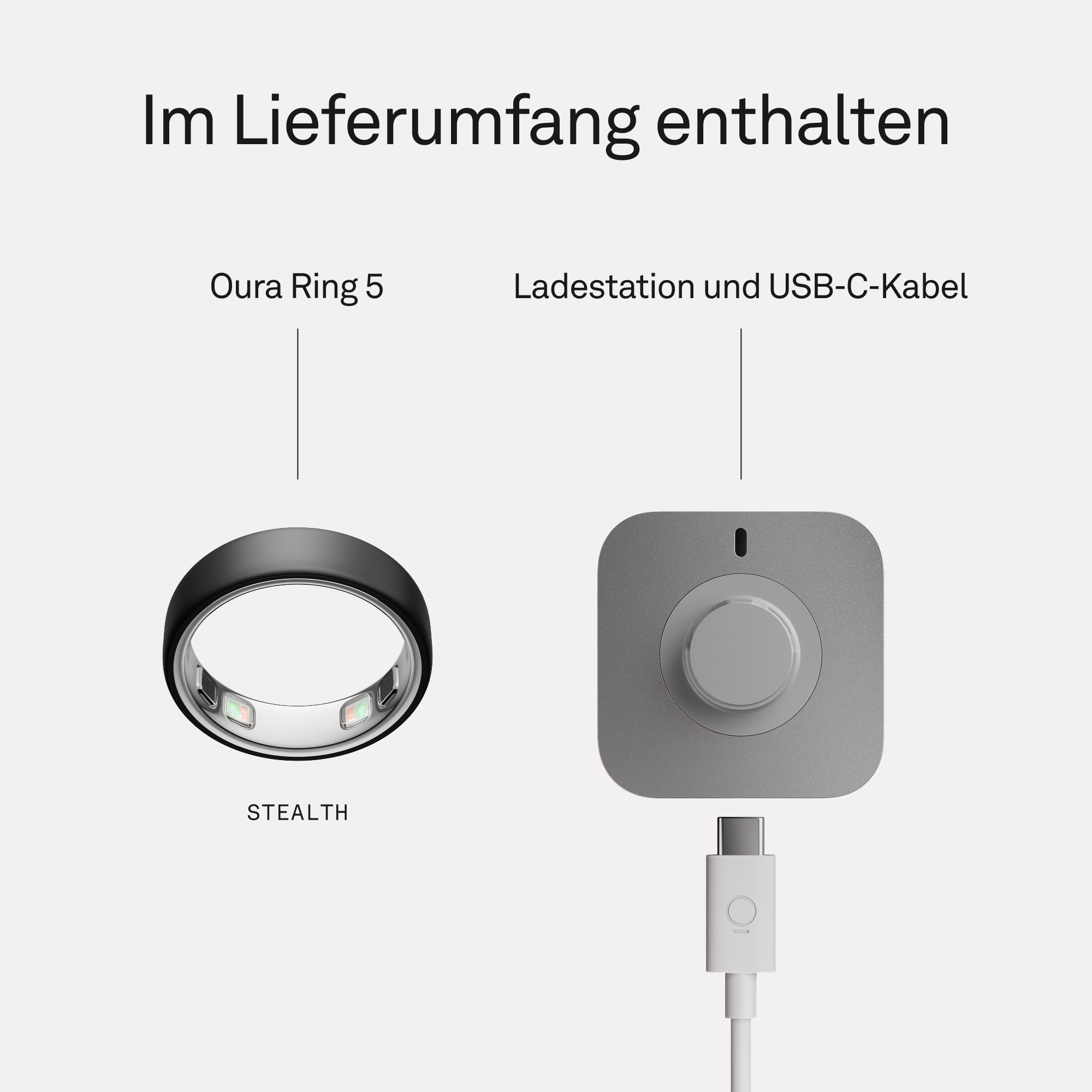 Schwarzer Oura Ring 5 und graue Ladestation mit USB-C-Kabel.