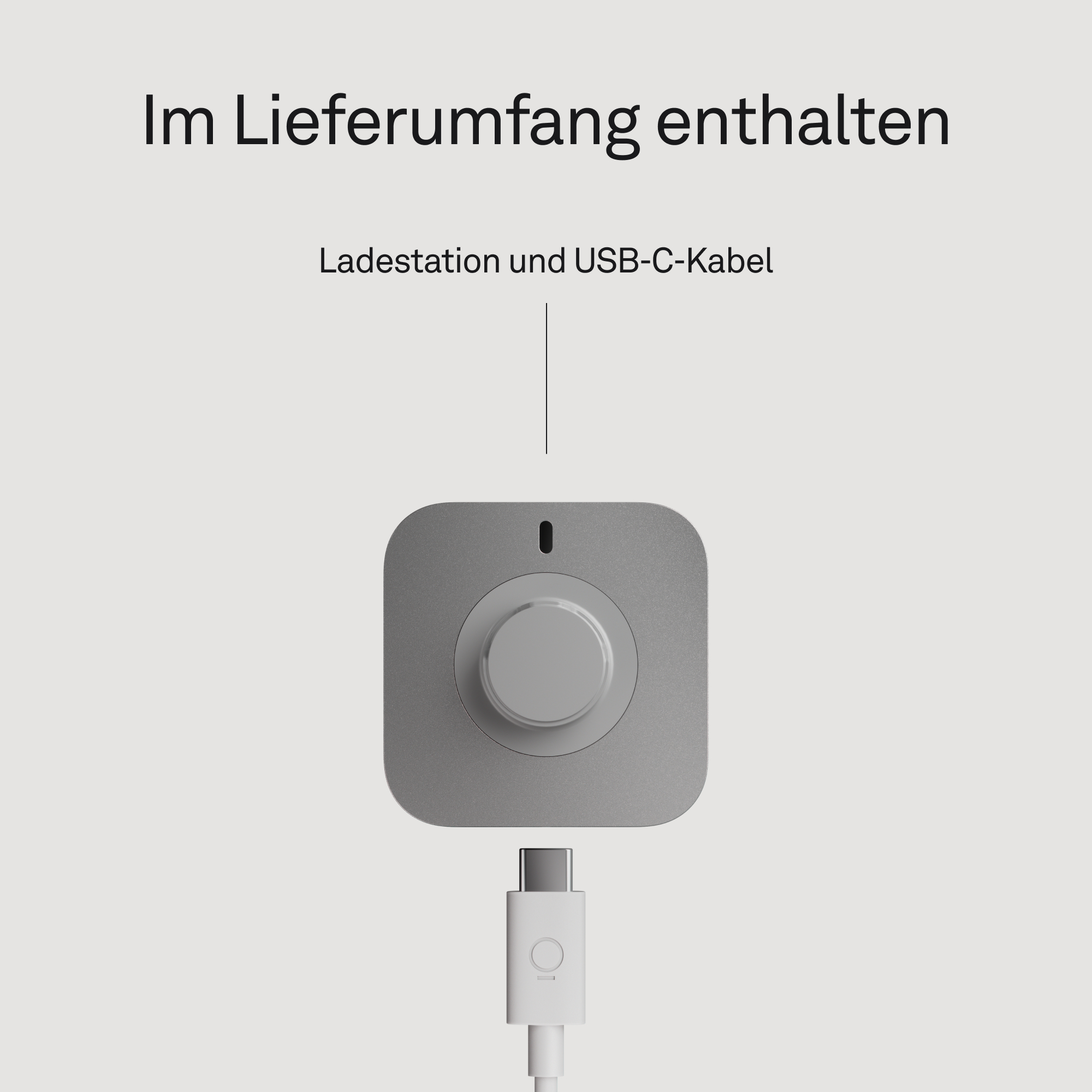 Grauer Ladeadapter mit Drehknopf und angeschlossenem weißem USB-C-Kabel.