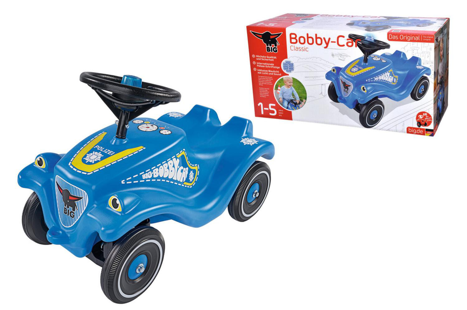 Blauer Polizei Bobby Car mit Lenkrad und Verpackung daneben.