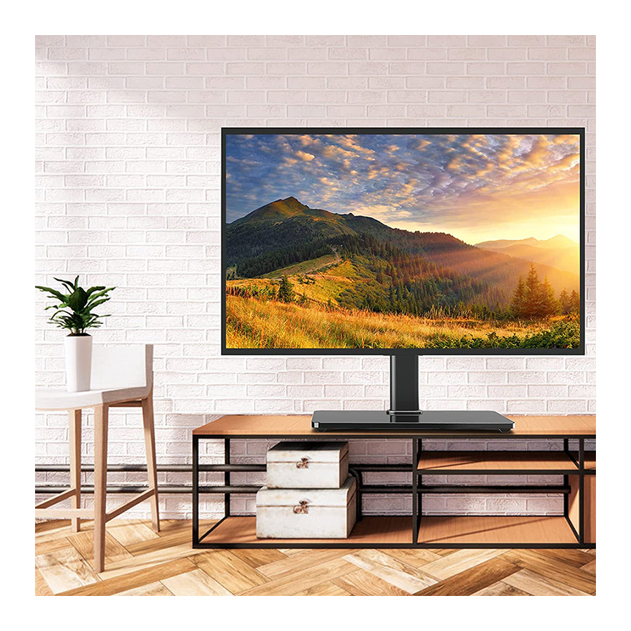 Egy modern TV áll faállványon fehér téglafal előtt.