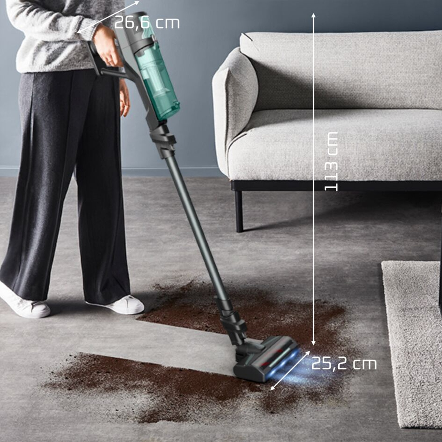 Aspirapolvere senza fili pulisce sporco marrone. Dimensioni: 26,6cm, 113cm, 25,2cm.
