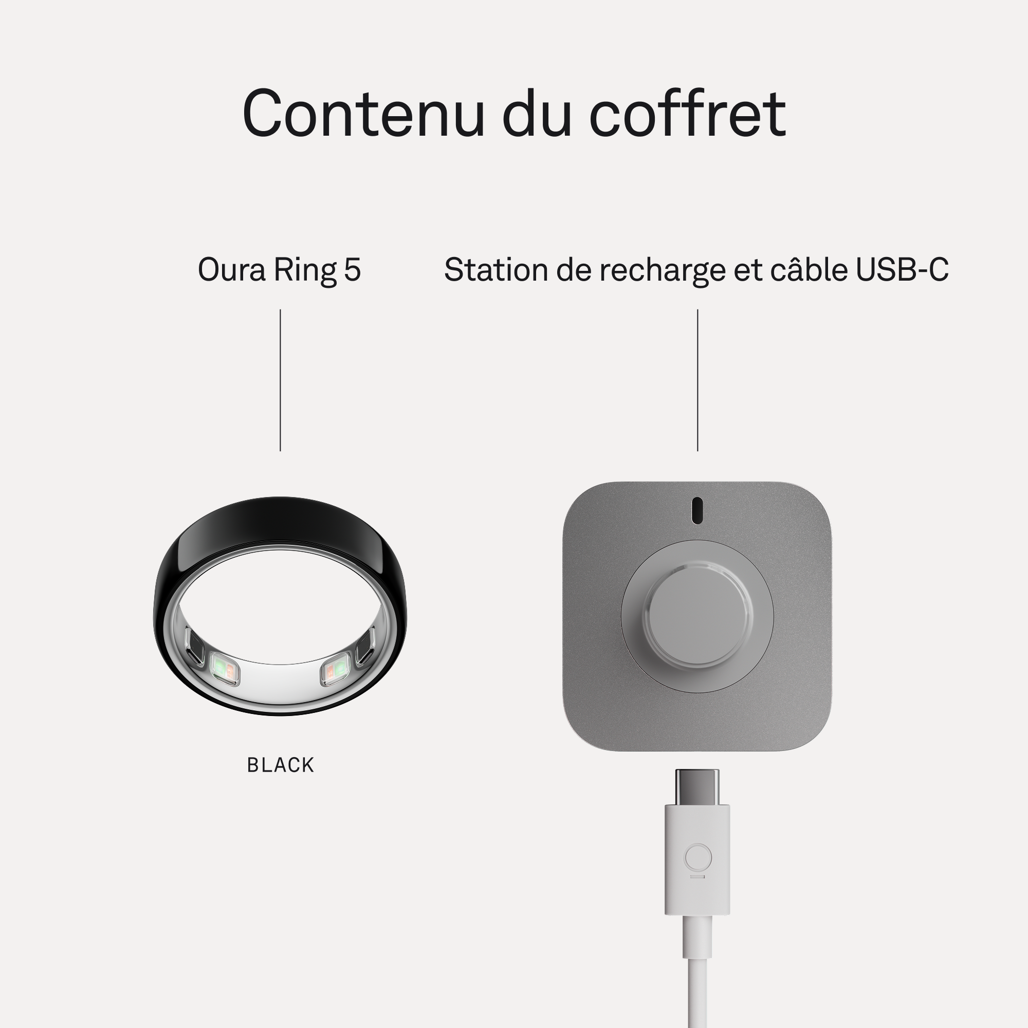 Un Oura Ring 5 noir et une station de recharge grise avec câble USB-C.