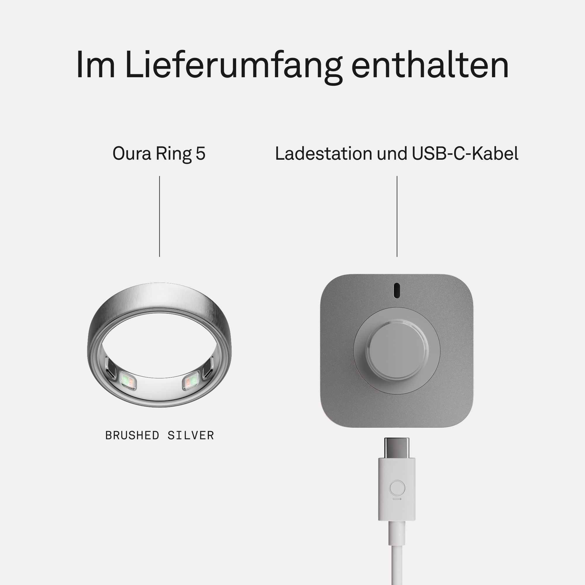 Silberner Oura Ring 5 und Ladestation mit USB-C-Kabel.