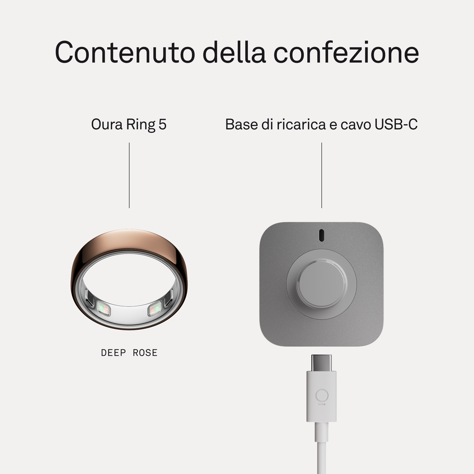 Un Oura Ring 5 color oro rosa e un caricatore grigio con cavo USB-C.