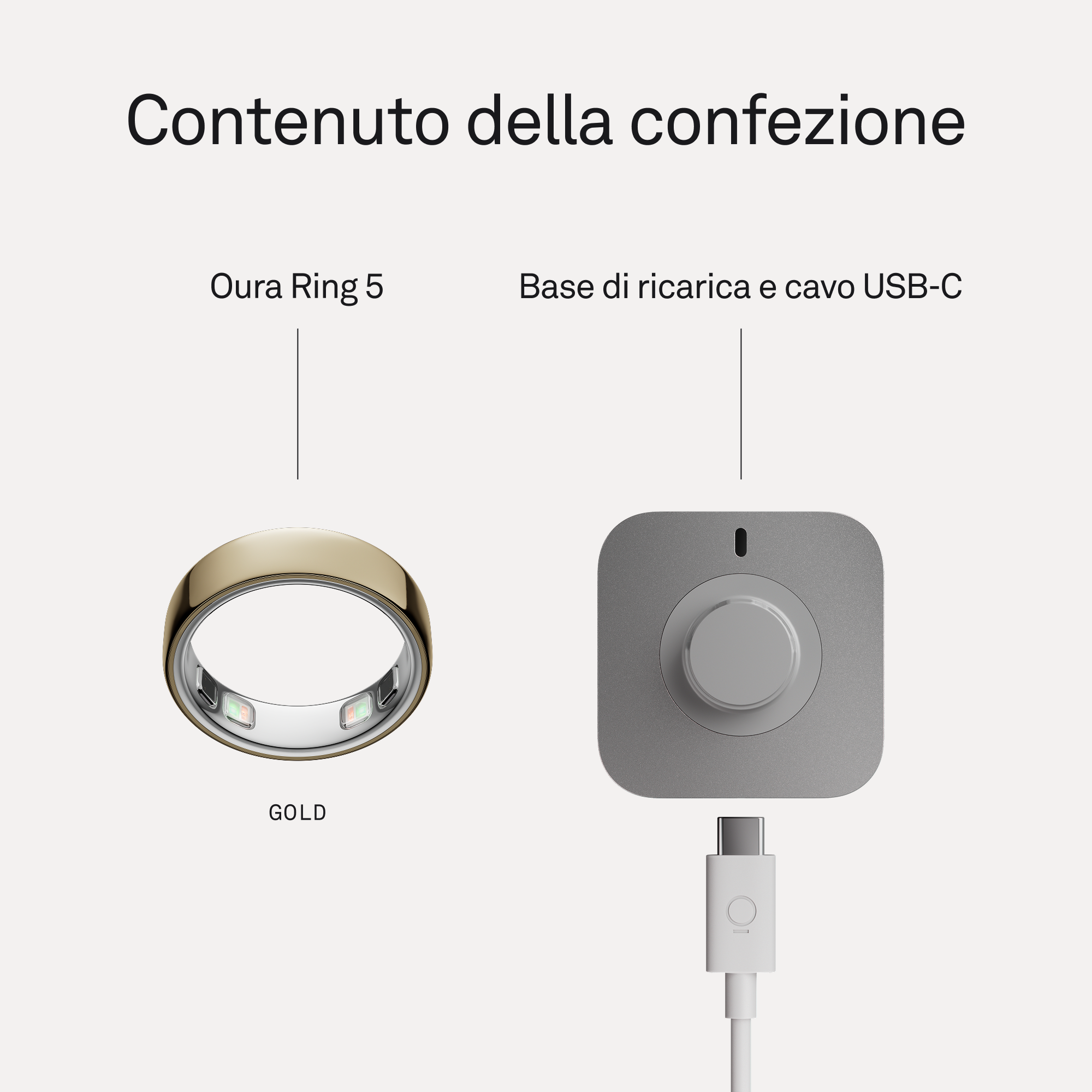 Un Oura Ring 5 dorato e base di ricarica grigia con cavo USB-C.
