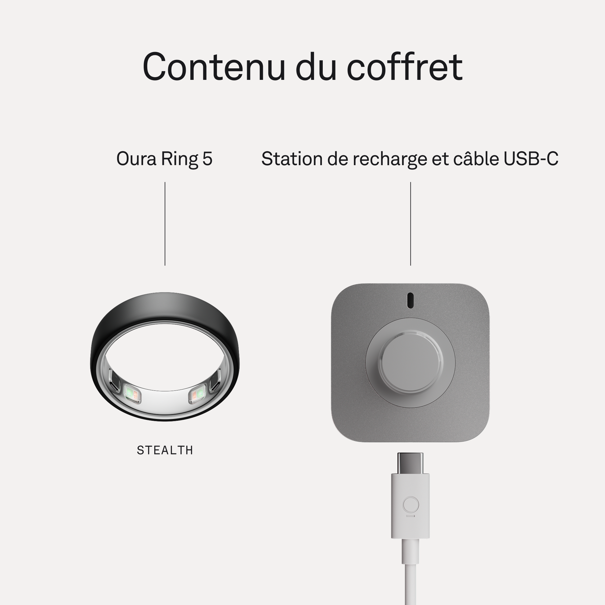 Une bague Oura 5 noire et une station de charge grise avec câble USB-C.