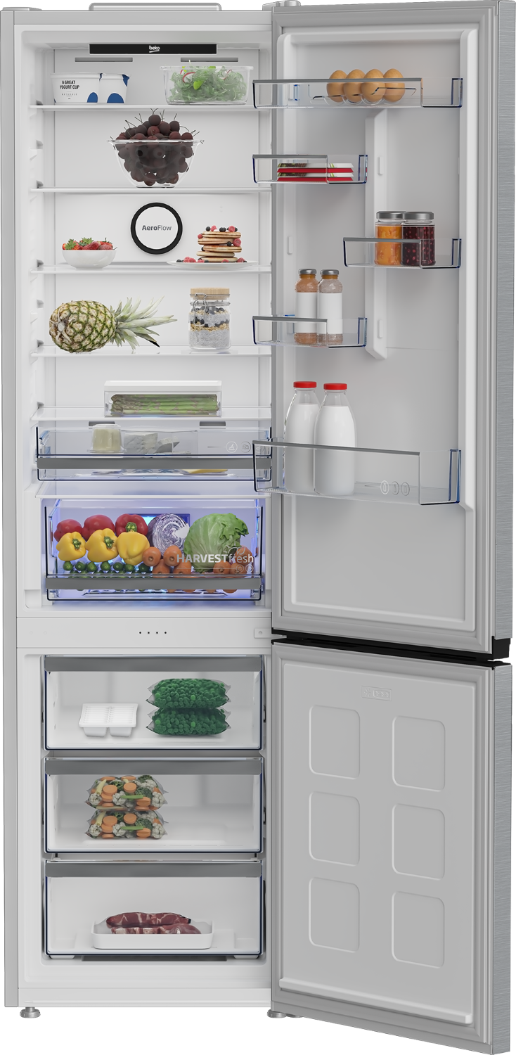 Refrigerador abierto con frutas, verduras, lácteos, huevos y carne.