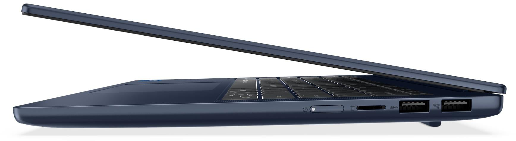 Sötétkék laptop profilból, enyhén nyitott képernyő, billentyűzet és portok láthatók.
