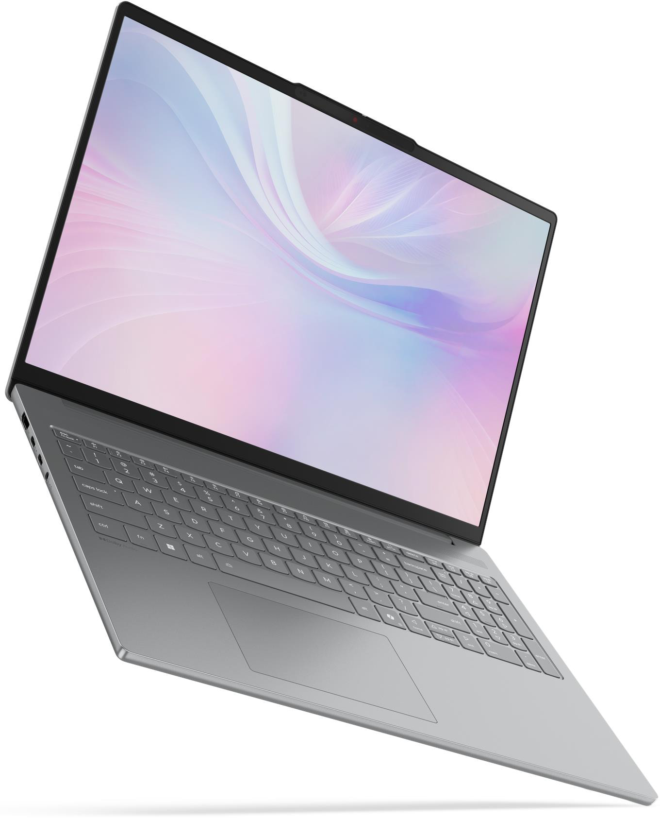 Ezüst laptop színes, absztrakt háttérképpel a képernyőn.