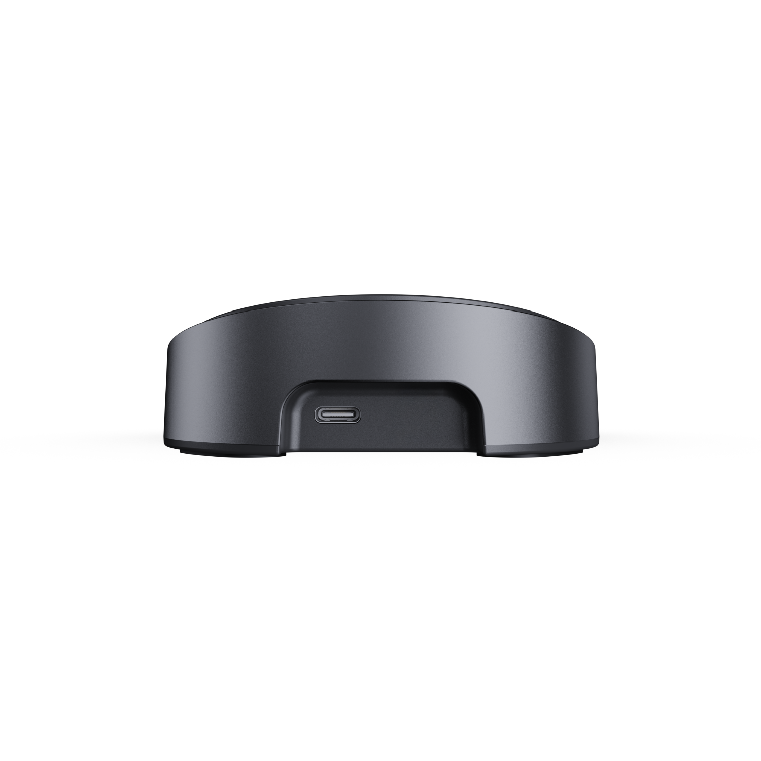 Dispositivo gris con puerto USB-C sobre fondo negro.