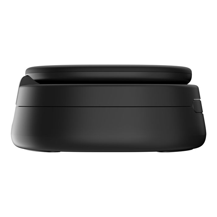 Dispositivo rectangular negro con bordes redondeados y superficie superior plana.