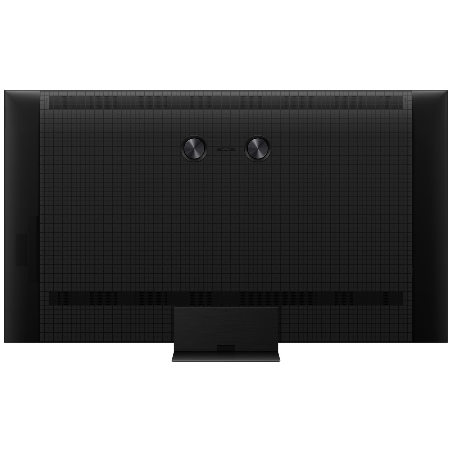 L'arrière d'un téléviseur noir avec motif en grille et deux boutons circulaires.