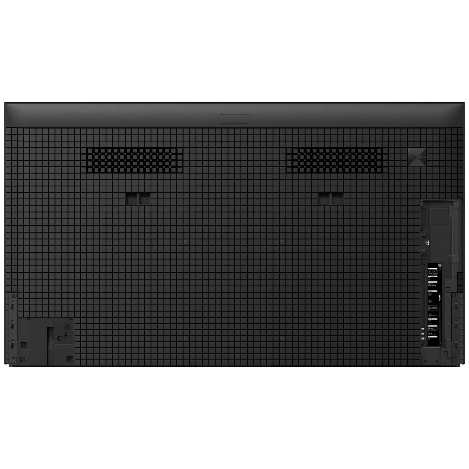 Arrière d'une télévision noire avec motif en grille et ports.