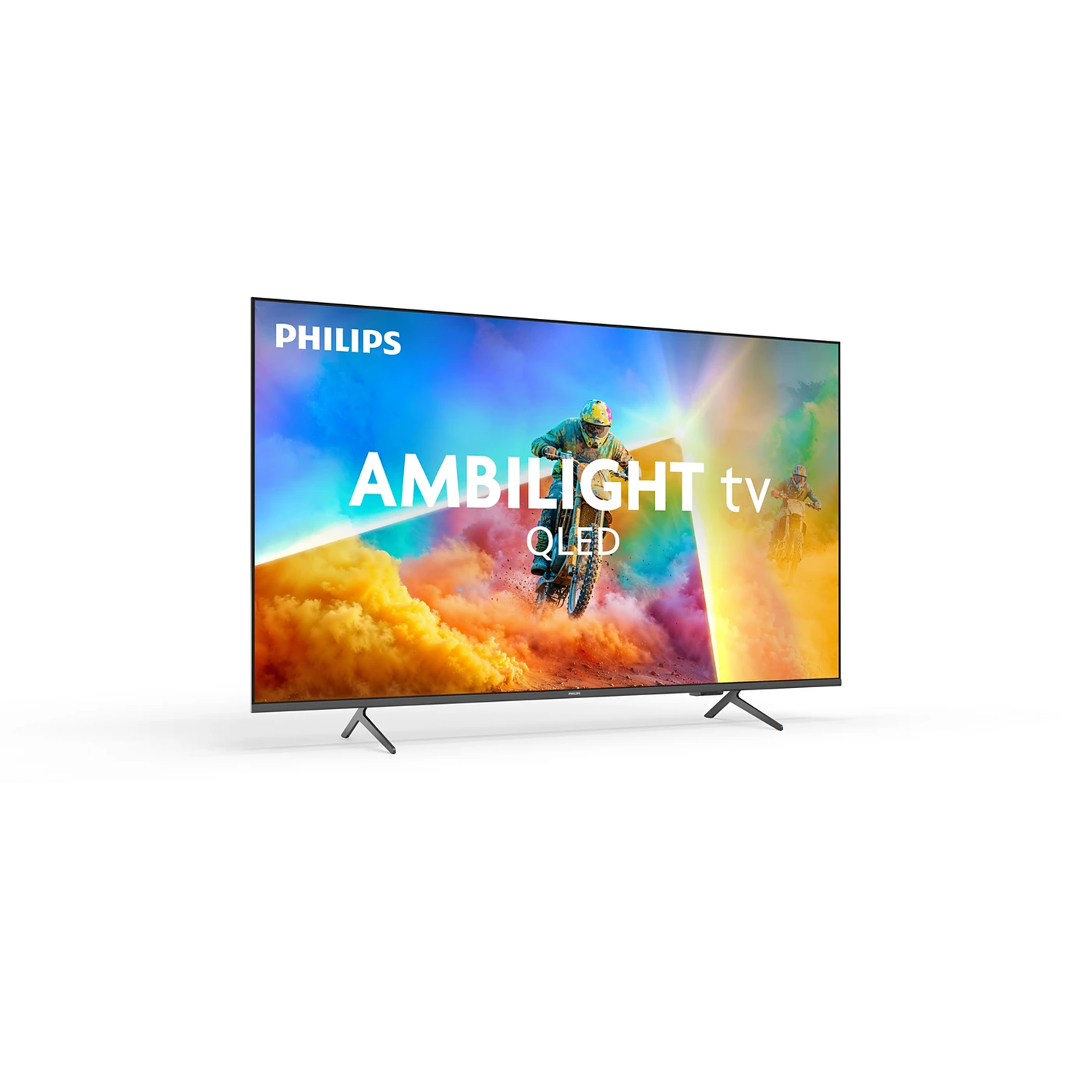 A Philips Ambilight QLED TV displays motocross riders against a colorful backdrop.