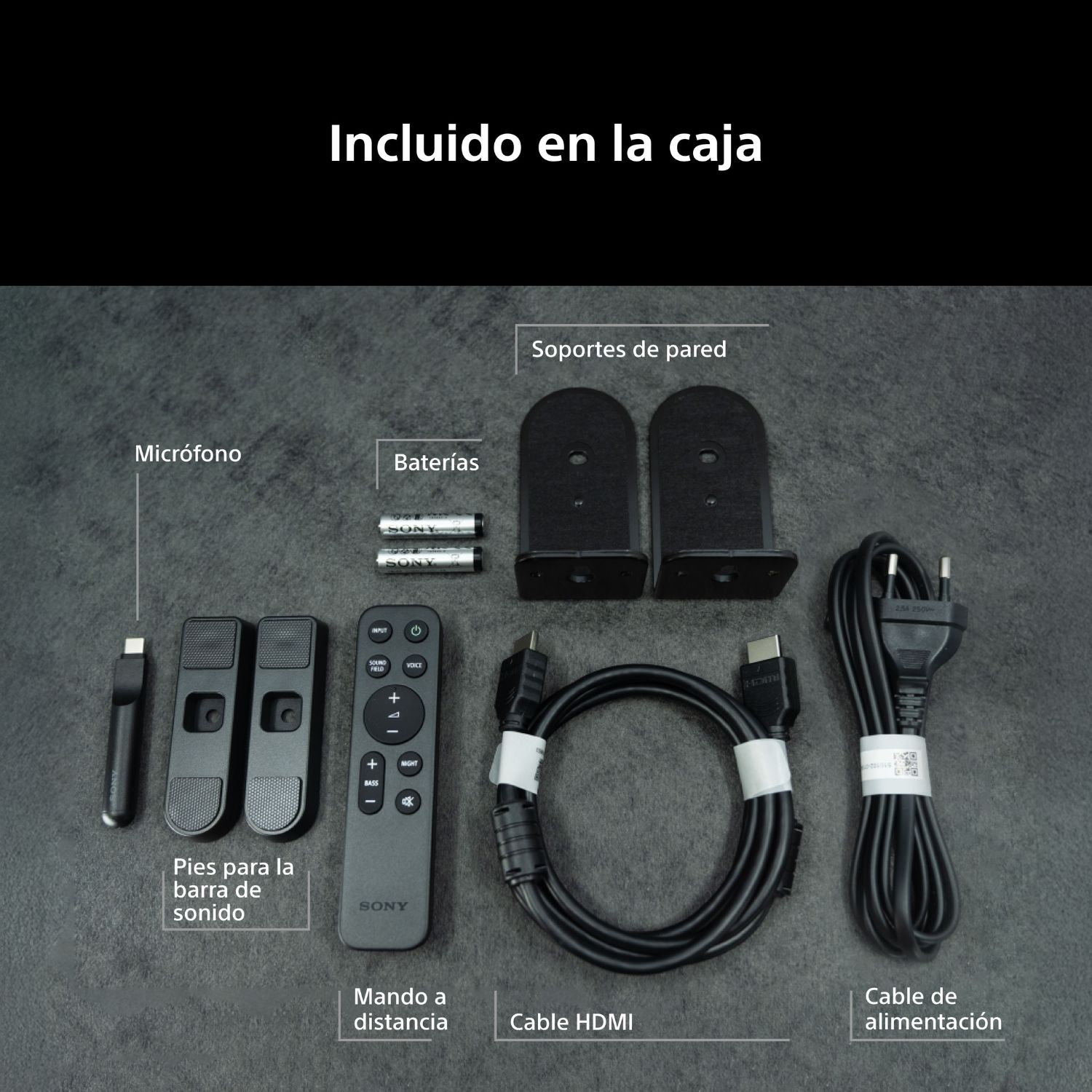 incluido en la caja: micrófono, pies, mando, pilas, soportes pared, cables HDMI y alimentación.