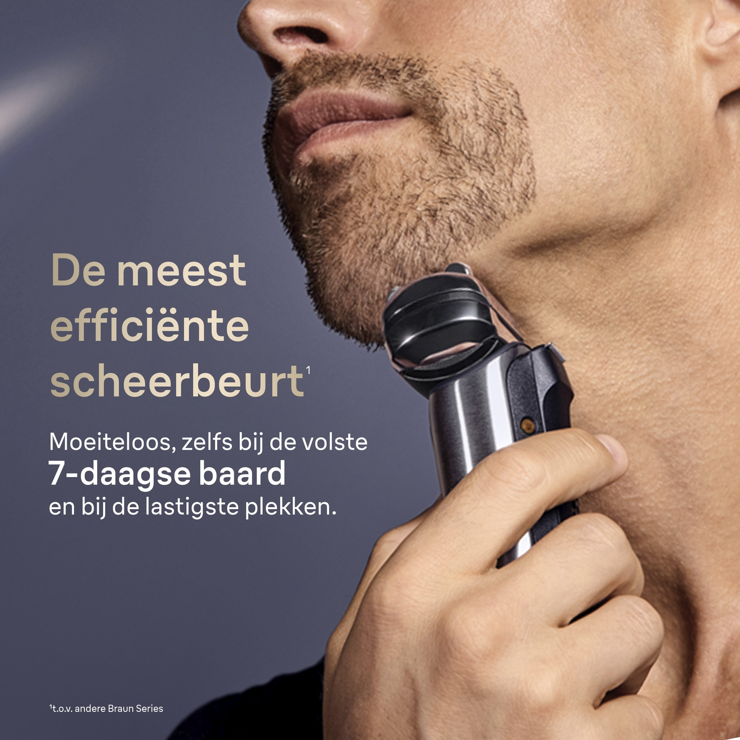 Man shaves with an electric shaver, trimming a 7-day beard.