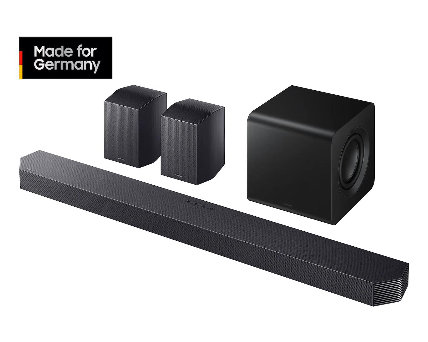 Schwarzer Soundbar, Subwoofer und zwei Lautsprecher mit "Made for Germany"-Logo.