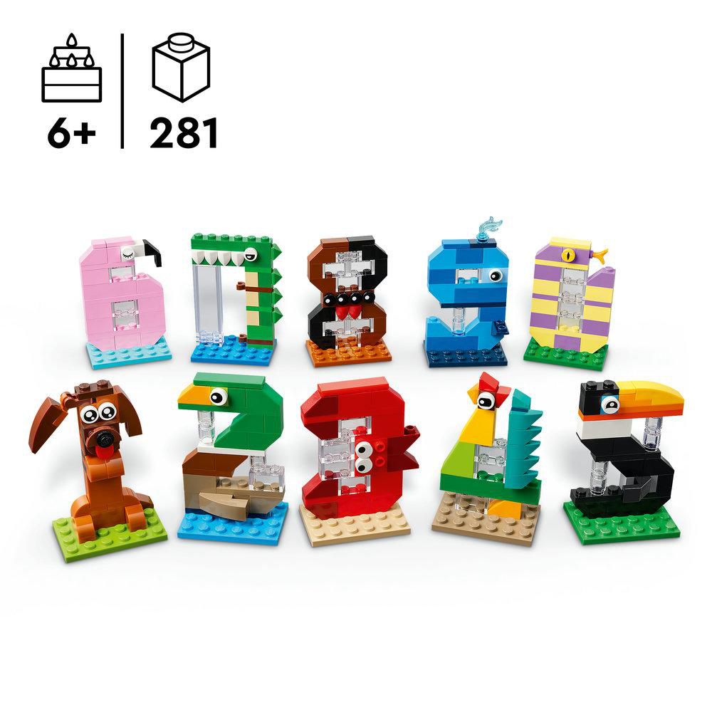 Bunte Legosteine formen Zahlen und Tiere auf weißen Grund.