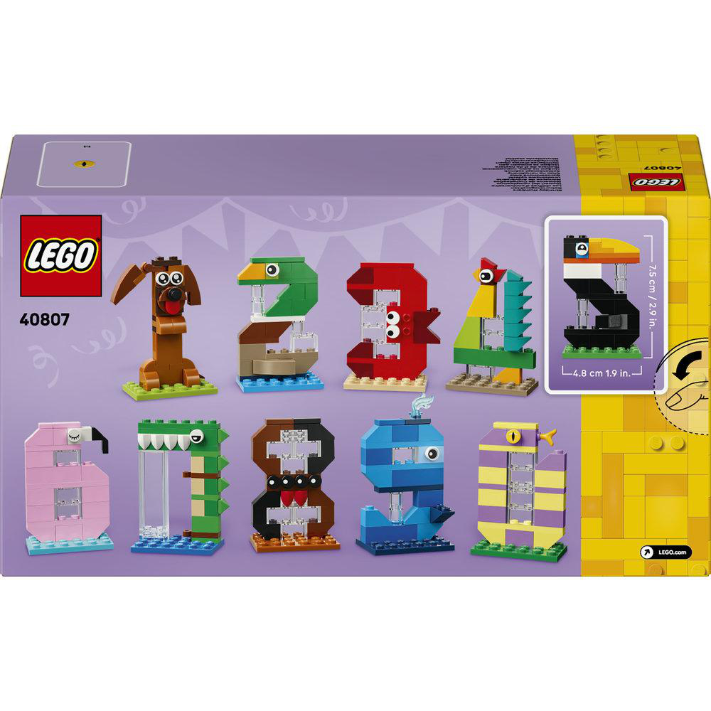 Lego-Box mit bunten Bausteinen, die Tiere und Zahlen darstellen.