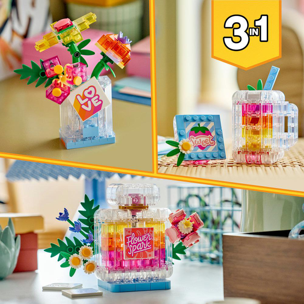 Drei LEGO-Bauspielzeug-Sets: Blumenstrauß, Getränk und Parfümflakon.