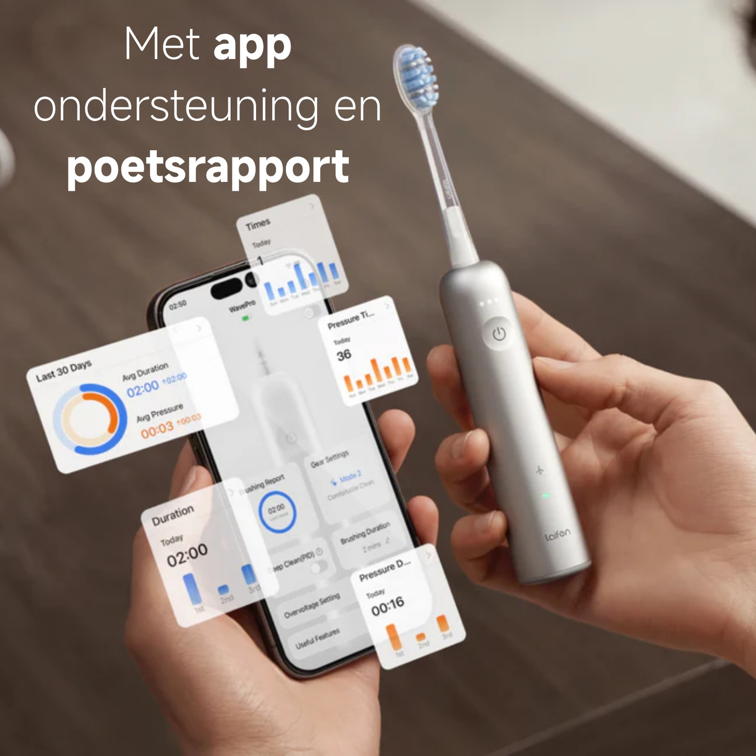 A hand holds a silver electric toothbrush next to a phone displaying app data.