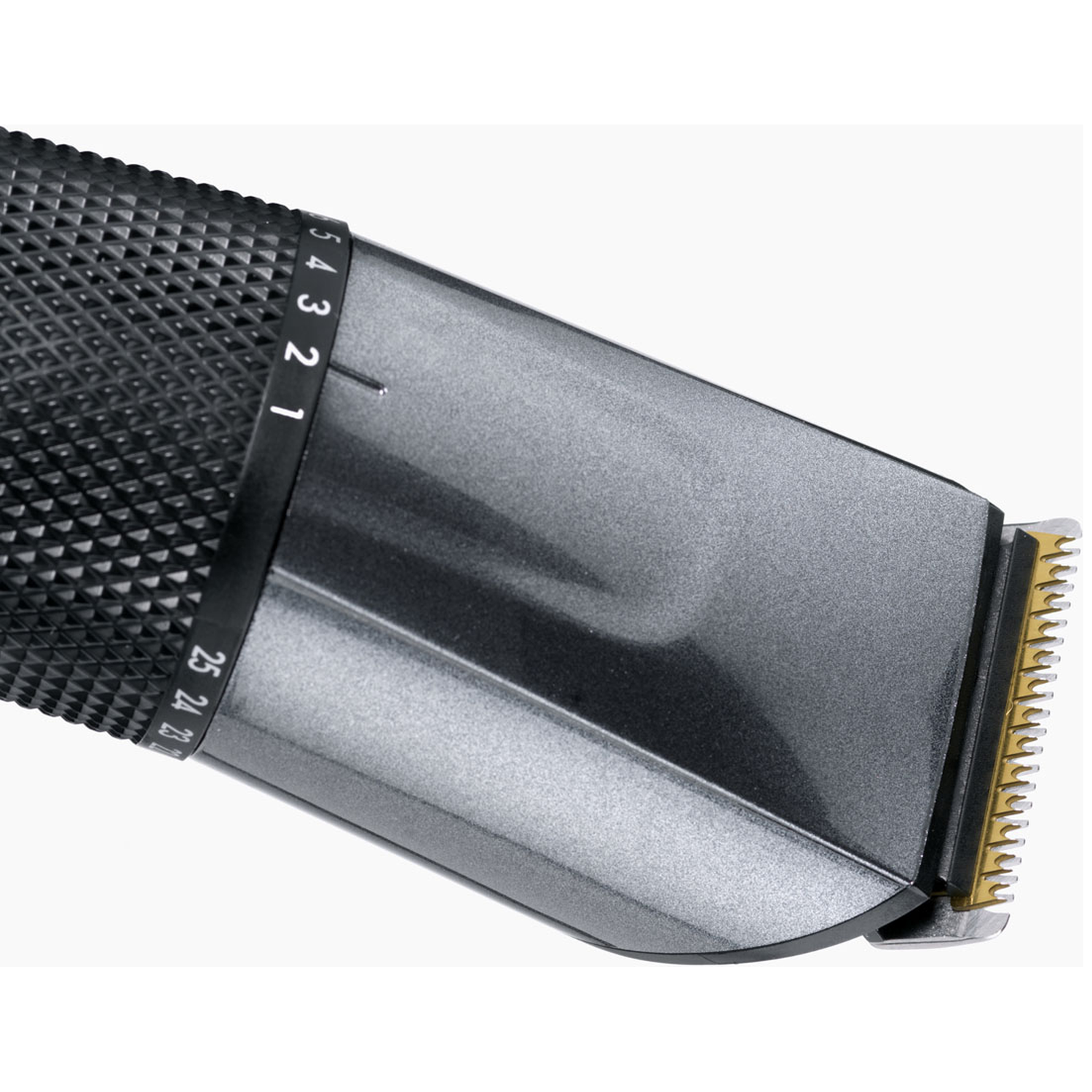 Close-up of a hair clipper with a black textured handle and silver body.