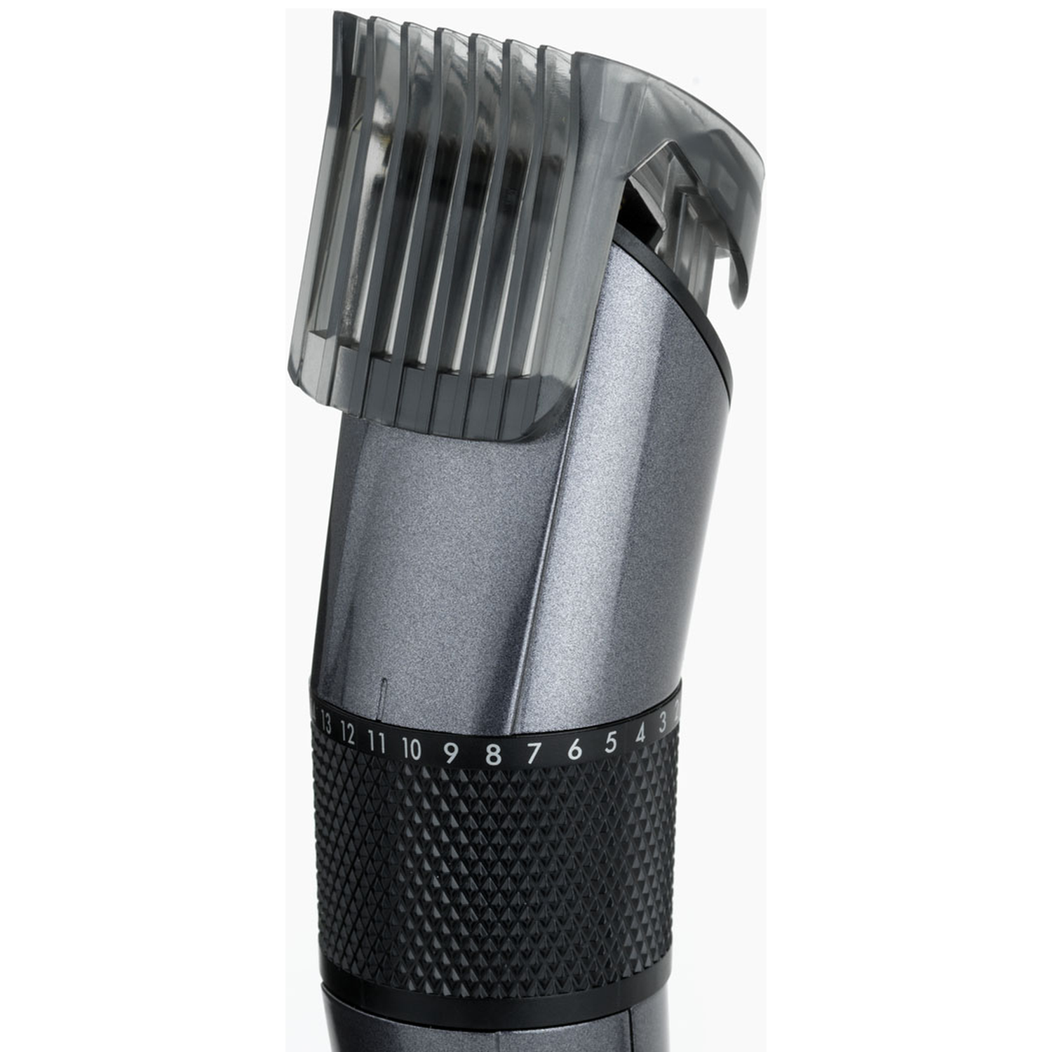 Close-up of a gray hair clipper with attachment and length adjustment.