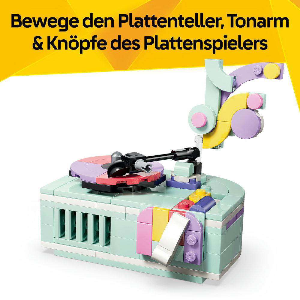 Buntes Lego-Modell eines Plattenspielers mit Plattenarm und Knöpfen.