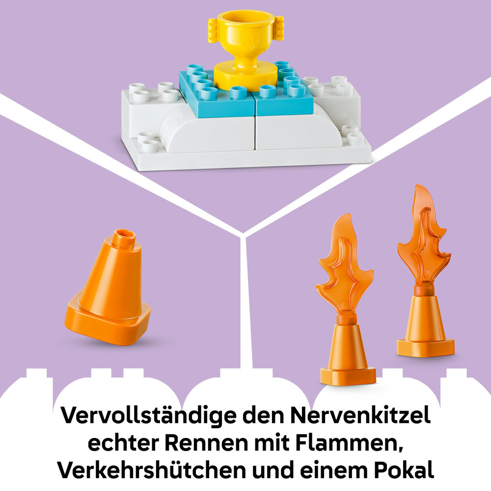 Gelber Pokal auf weiß-blauen Lego-Steinen, orangefarbener Verkehrshütchen und Flammen.