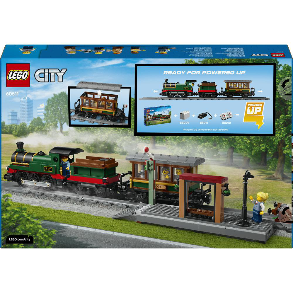 LEGO City Zugset mit Lok, Waggon und Bahnhofsmodul. Grüne Lok mit roter Kupplung.