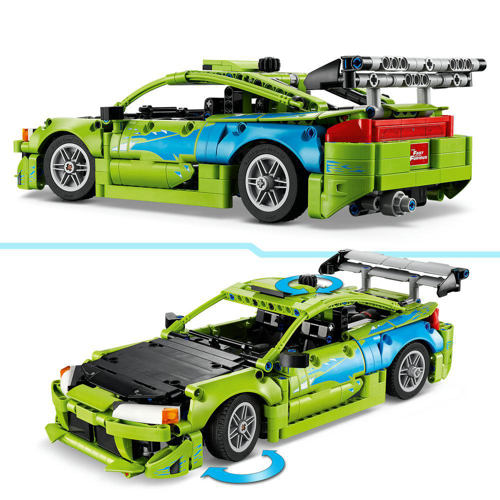 Ein grüner und blauer Spielzeug-Rennwagen mit Flügeln und Aufklebern.