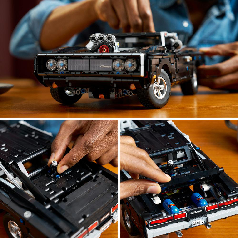 Ein schwarzes Lego-Auto mit V8-Motor wird zusammengebaut.