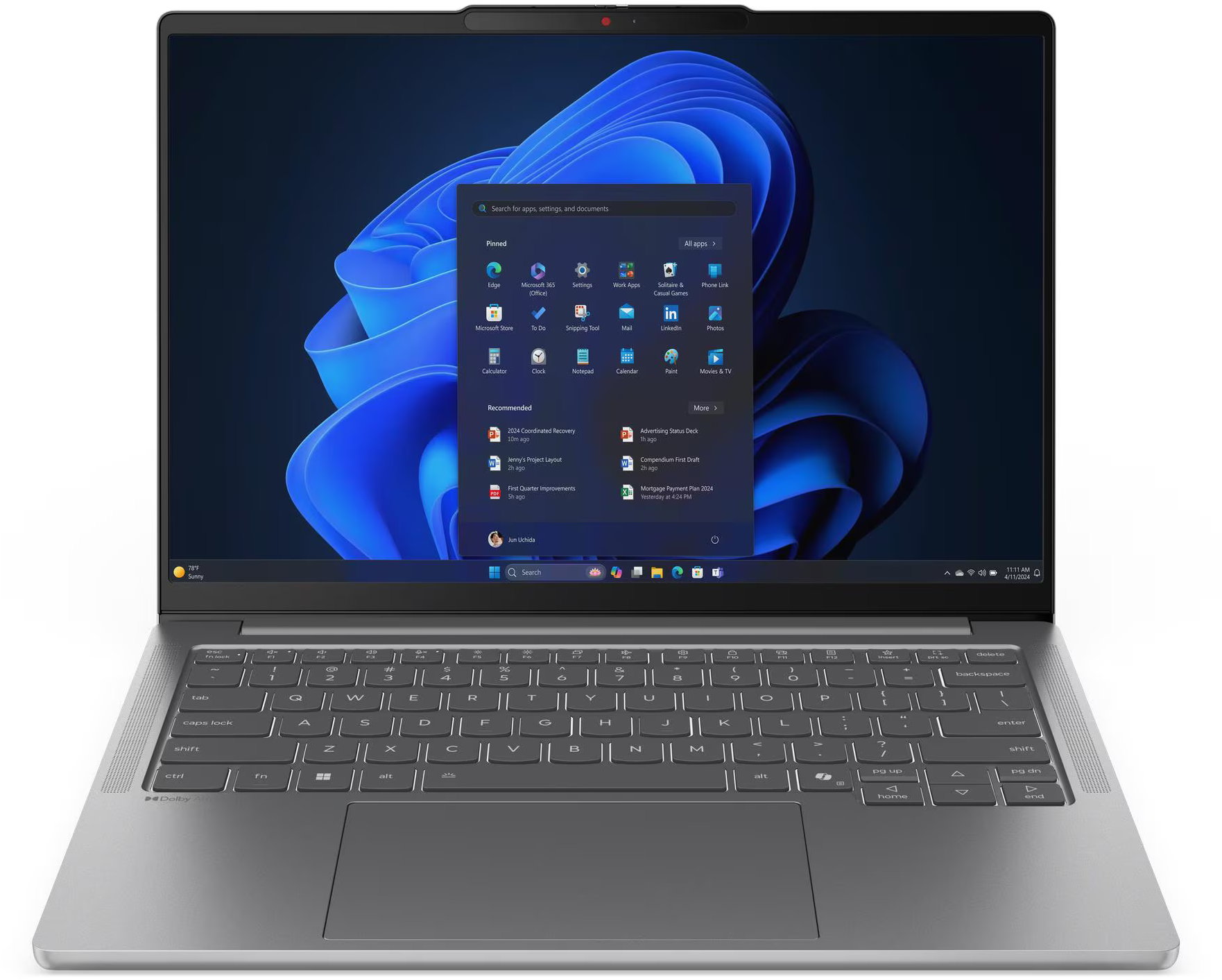 Egy laptopon a Windows 11 indít menüje látható kék és fekete háttérrel.