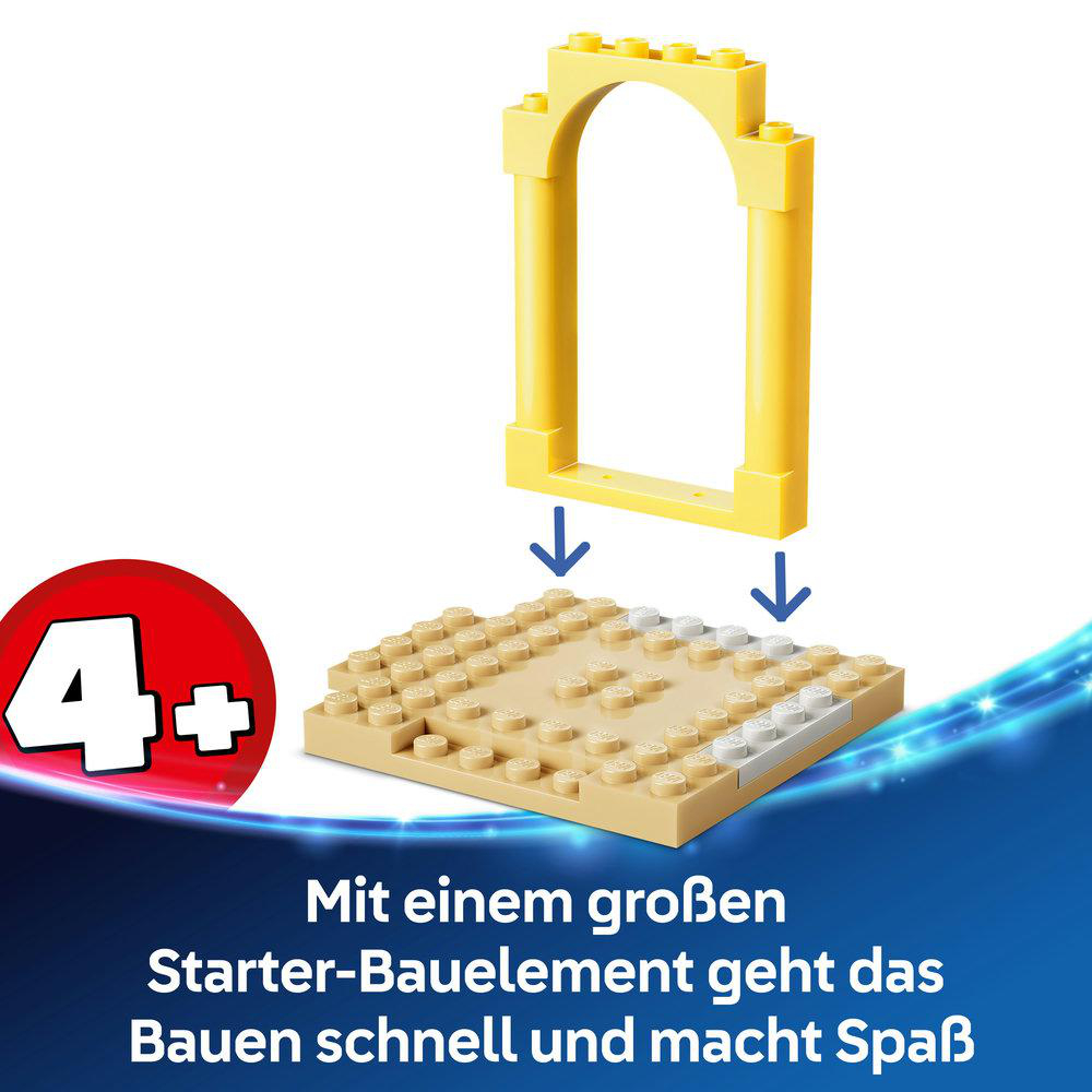 Gelber Legobogen über einer sandfarbenen Platte mit Pfeilen.