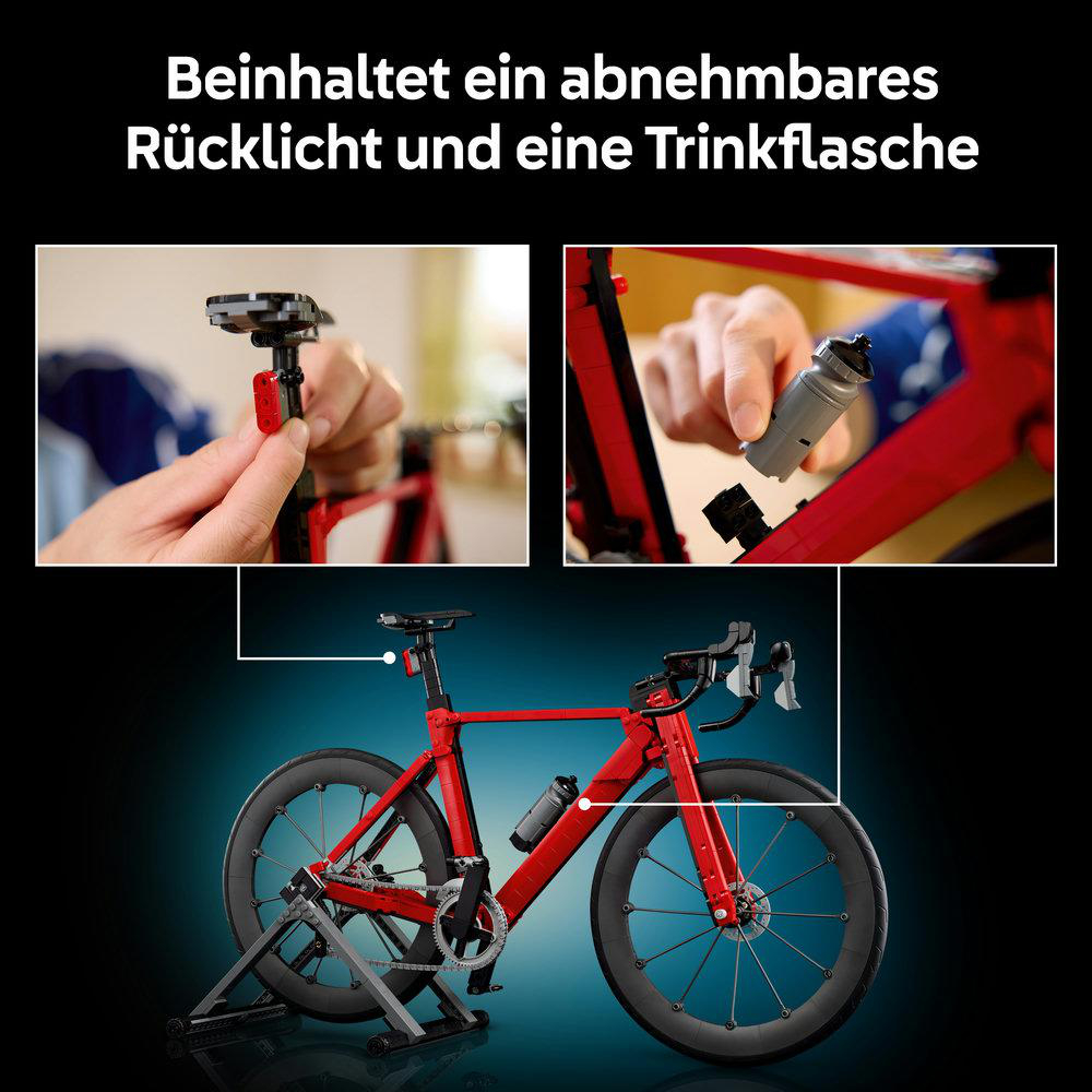 Rotes Rennrad mit abnehmbarem Rücklicht und Trinkflasche im Set.