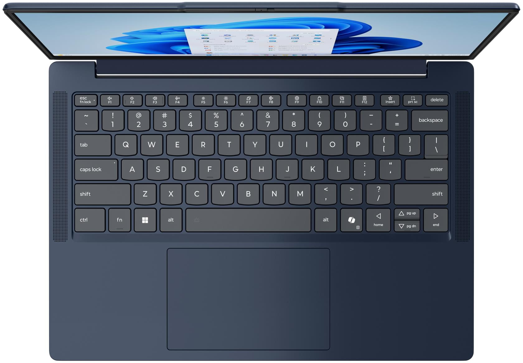 Sötétkék laptop nyitott képernyővel, amely a Windows 11 operációs rendszert jeleníti meg.