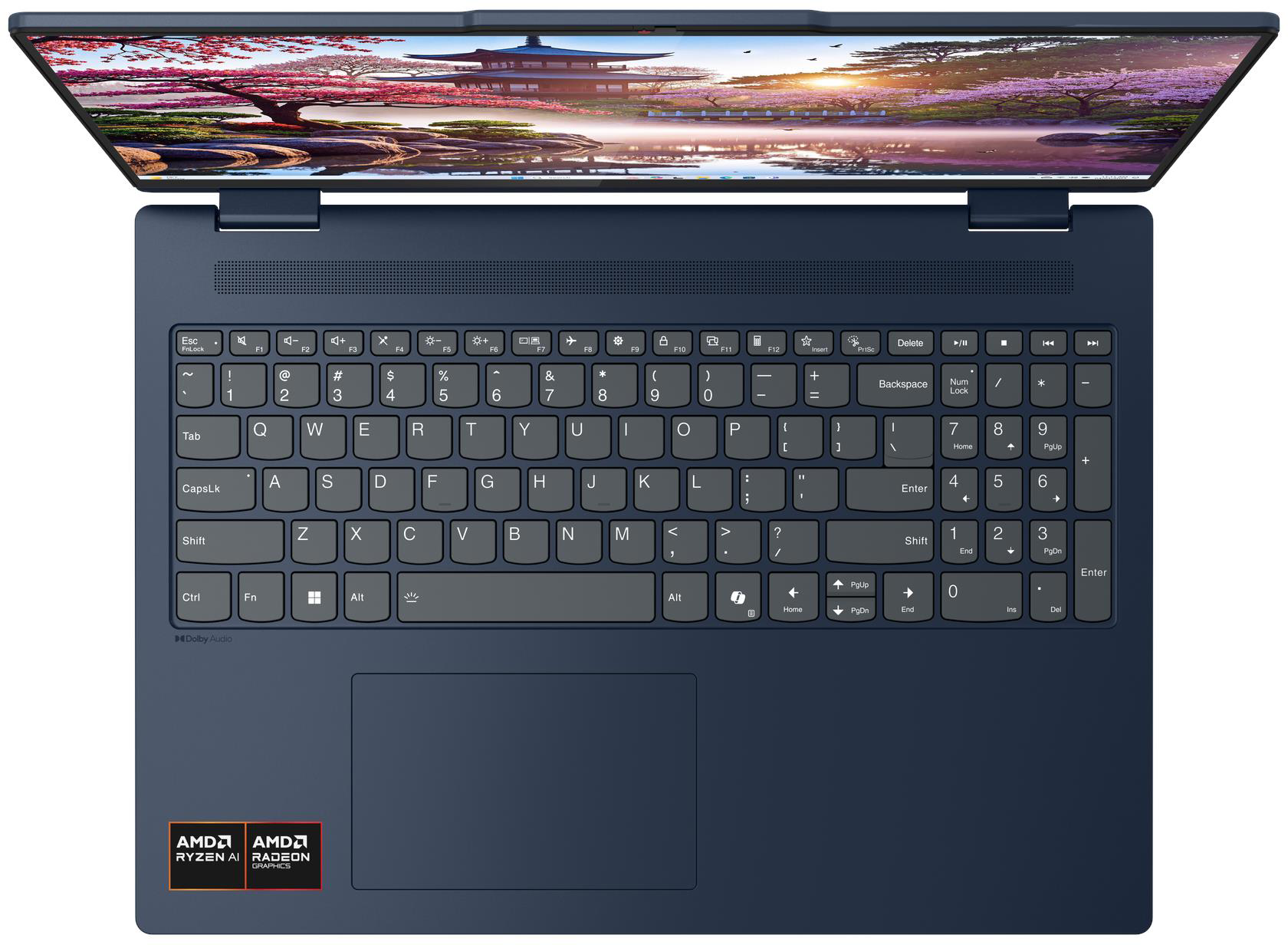 Egy nyitott kék laptop tájképet jelenít meg a képernyőjén.