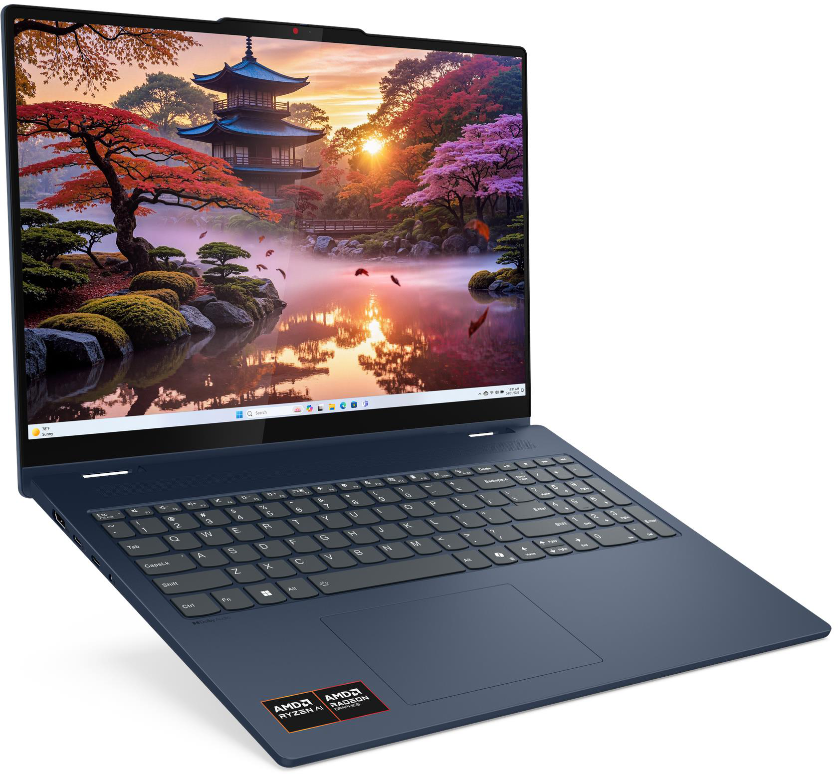 Egy kék laptop japán kertet ábrázoló képernyővel.