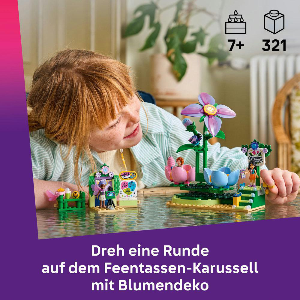 Ein Mädchen spielt mit einem LEGO-Karussell mit Blumen und Figuren.