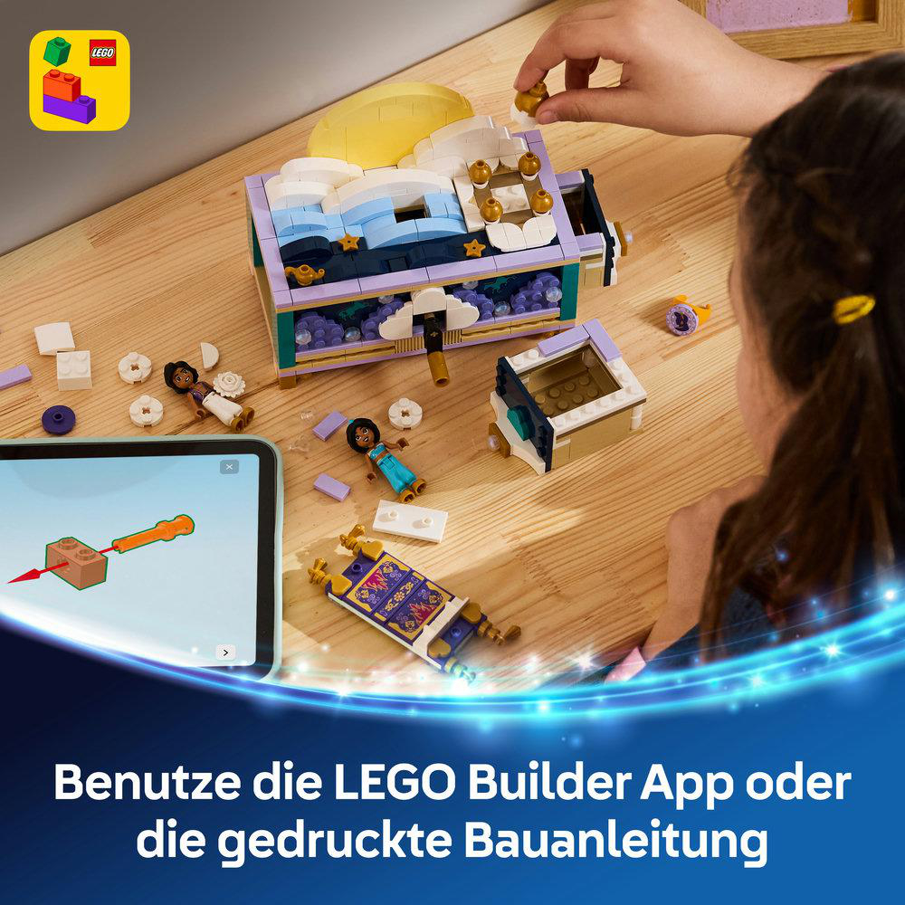 Ein Kind baut ein Lego-Set mit Prinzessinnenfiguren und einem Teppich, daneben eine Bauanleitung.