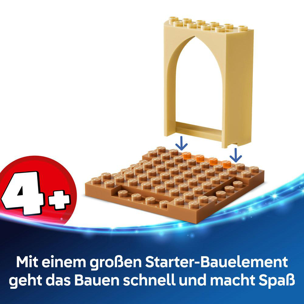 Ein beigefarbener Torbogen ragt über braune Lego-Bausteine.