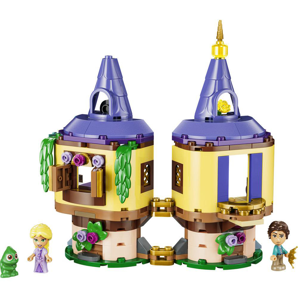 Zwei LEGO-Türme mit lila Dächern, gelben Wänden und Figuren.